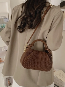 Brown woven leather bucket bag for women, stylish crossbody handbag with gold hardware