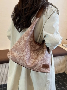 Pink jacquard tote bag with white floral patterns and brown leather trim for women