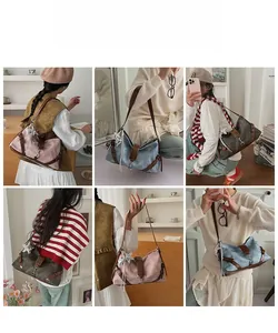 Detail view of canvas and leather shoulder bag with chic star charm in various colors
