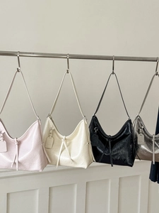 Stylish large capacity hobo tote bag in shiny oil wax leather with pleated drawstring detail