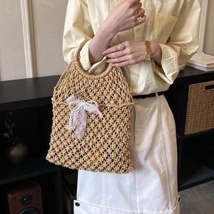 Hollow out woven beach tote bag with white lace bow decoration and round handles
