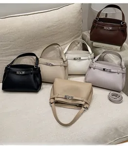 Collection of women's lychee grain leather mini bags with side handles in various colors