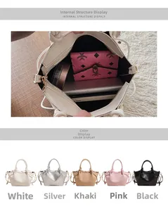 Internal structure of minimalist faux leather handbag showing capacity with zipper pockets