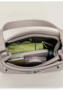 Interior view of lavender crossbody bag showing spacious capacity for daily essentials