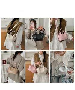 Model showcasing multiple colors of the minimalist bucket bag in a stylish home setting