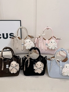 Chic multi-color bucket bags with ribbon bows and plush pendants in five stylish colors