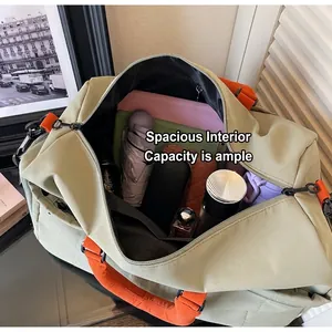 Detail view of khaki green travel bag interior showing large capacity and items