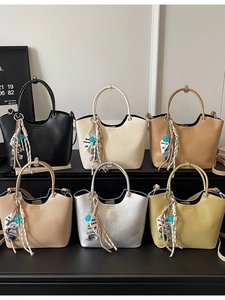 Minimalist bucket tote bags with bear charm in six colors including black and cream white
