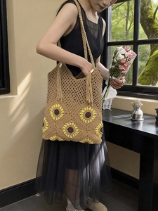 Handmade crochet sunflower tote bag with bohemian tassels and large capacity design