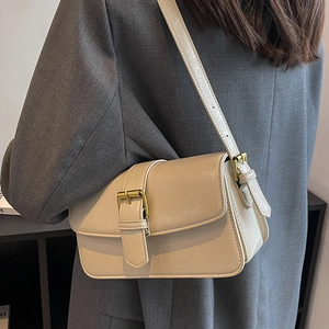 Chic light brown glossy leather crossbody bag with vintage golden buckle detail