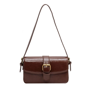 Classic dark brown vintage shoulder bag with golden buckle and glossy leather finish