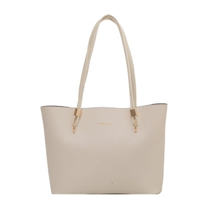 Minimalist beige tote bag with gold hardware and slim shoulder straps for women