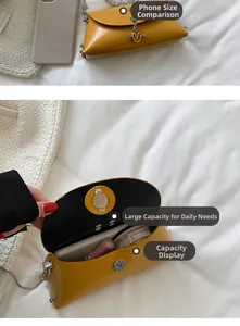 Detail view of yellow crossbody bag interior showing large capacity for phone and cosmetics