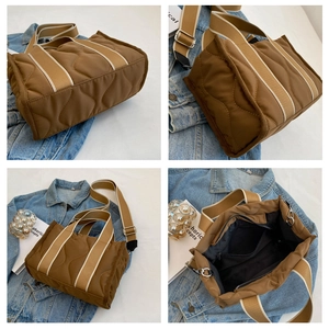 Detalle del bolso tote acolchado de nailon marrón con correa de hombro tejida ajustable