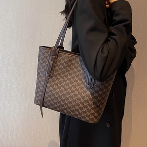 Large capacity monogram tote bag in coffee brown leather for stylish office commuting