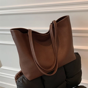 Dark brown pebbled leather tote bag with long straps for women's casual commute