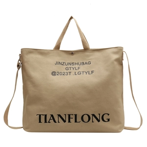 Large capacity canvas tote bag in beige with black text for daily commuting use