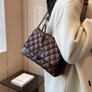 Quilted crossbody chain bag in dark brown faux leather for women, minimalist chic style