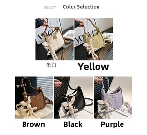 Selection of chic hobo bags in five colors with cute rabbit charms and shoulder straps