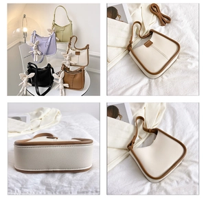 Detail view of stylish half-moon underarm bags in various colors and PU leather finish