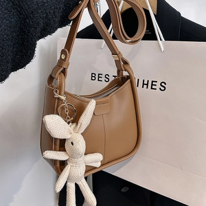 Brown leather hobo shoulder bag for women with cute bunny pendant for summer fashion