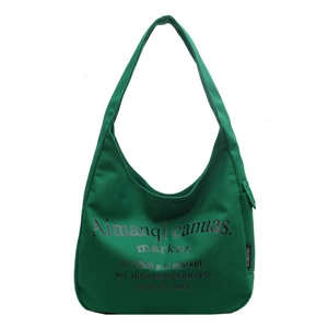 Green canvas hobo tote bag with artistic letter print and wide shoulder strap
