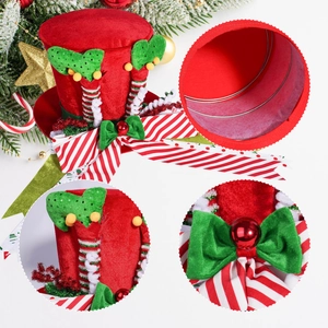 Detail of Christmas tree topper hat with velvet fabric, internal metal frame and festive bow