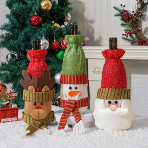 Three-piece Christmas bottle cover set featuring Santa, Reindeer and Snowman designs