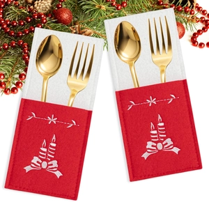 Detail of red felt Christmas envelope cutlery pouch with white candle embroidery