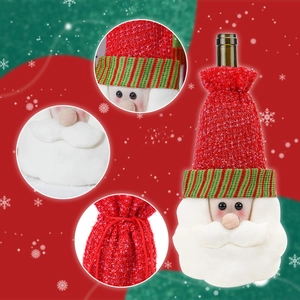 Detail of Santa knitted wine bottle cover with drawstring and soft plush beard textures