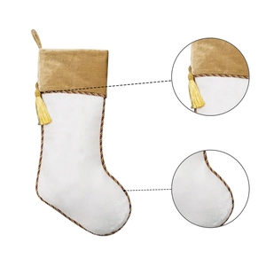 White velvet Christmas stocking with gold trim, plush fabric, and elegant hanging tassels