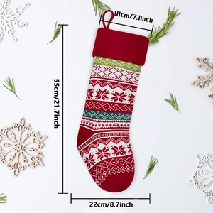55cm knitted Christmas stocking with Fair Isle pattern and size dimensions on white backdrop