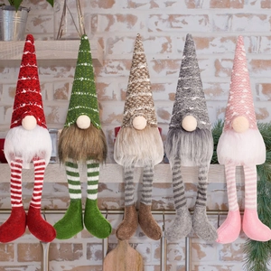 Set of five handmade Christmas gnomes with long striped legs for festive home decor