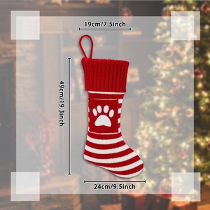 Detail view of red and white striped knit pet stocking with dimensions 49x19x24cm