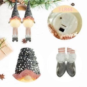 Lot de deux gnomes de Noël lumineux avec chapeaux à paillettes et longues jambes décor