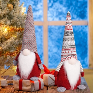 Christmas gnome plush dolls with Nordic knit hats in a festive holiday home setting