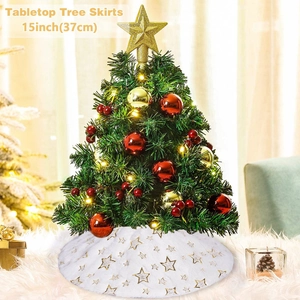 Close-up of 15-inch white faux fur tabletop tree skirt with gold stars and warm lights