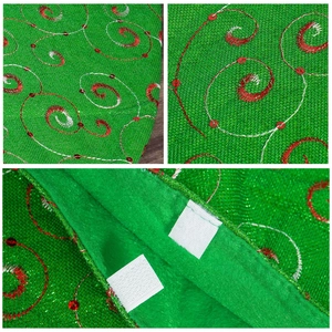 Green Christmas tree skirt with red spiral embroidery and sequins featuring velcro closure