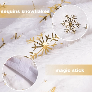 Detail of white plush tree skirt with gold sequin snowflakes and magic stick closure