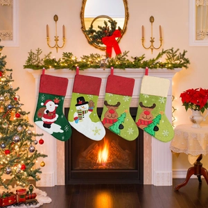 Detailed close-up of four festive Christmas stockings hung on a fireplace mantel