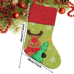 Green Christmas stocking with reindeer design and 44cm dimensions for holiday decor
