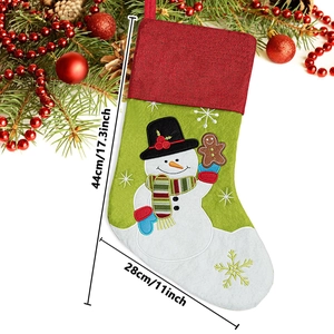 Detail of Christmas stocking with snowman embroidery and dimensions 44cm by 28cm