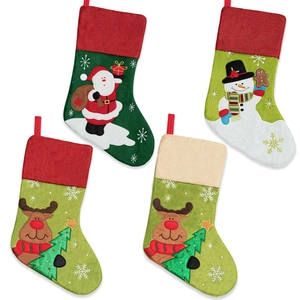 Festive Christmas stockings set featuring Santa, Snowman, and Reindeer plush designs