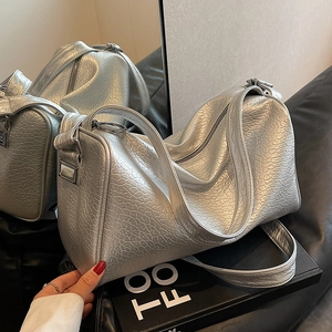 Metallic silver Boston bag with pleated texture and top handles for women