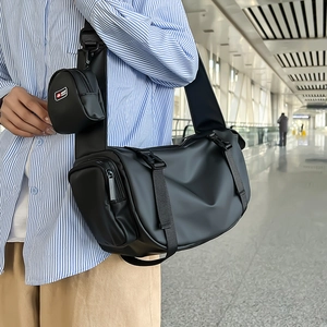 Large black multipurpose crossbody travel bag set with matching round pouch for women