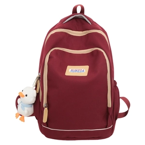 Large capacity burgundy casual backpack for school or travel with a cute duck charm