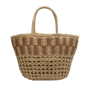 Summer woven straw tote bag with hollow mesh pattern and dual handles on white base