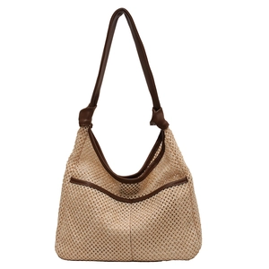 Beige woven mesh hobo bag with dark brown leather straps for summer beach travel
