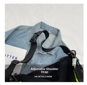 Macro detail of adjustable black nylon strap with high-strength plastic buckle on tote bag