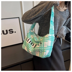 Detail showing high-quality white and green checkered canvas fabric with simple text